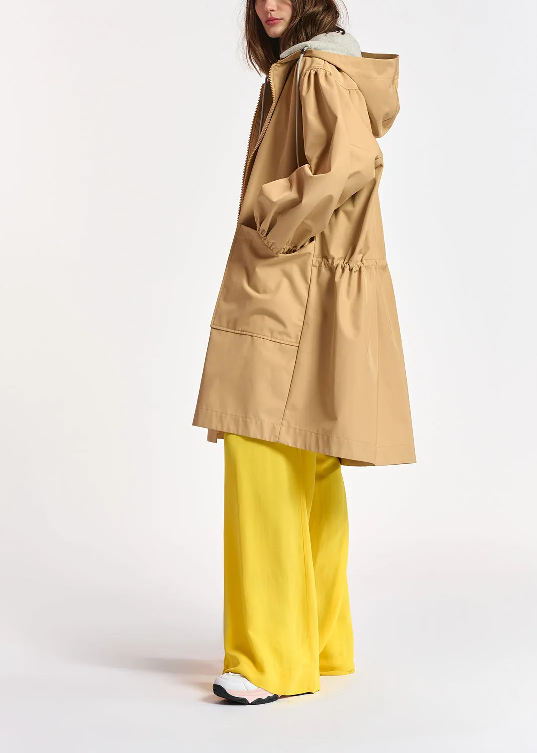 Beige hooded raincoat