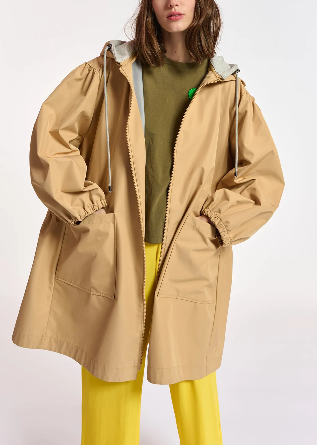 Beige hooded raincoat