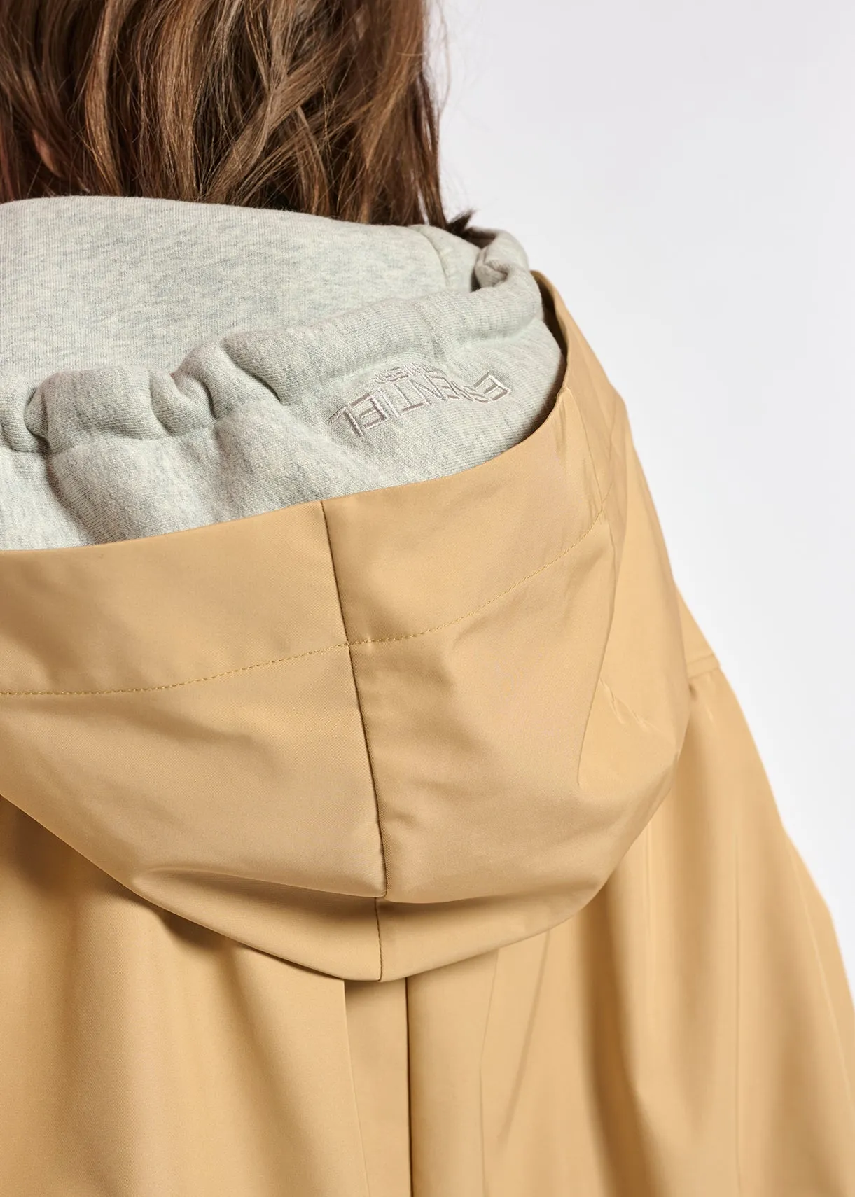 Beige hooded raincoat
