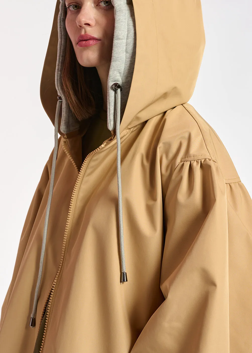 Beige hooded raincoat