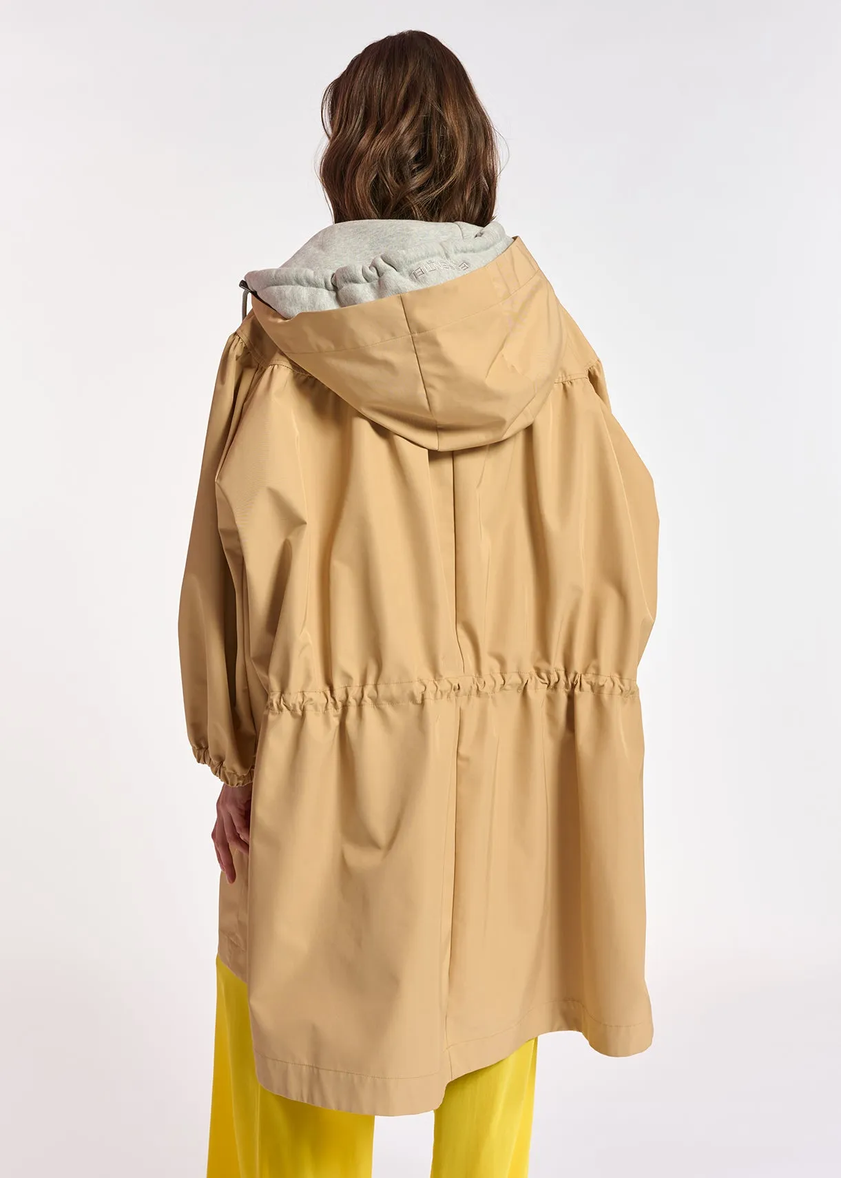 Beige hooded raincoat