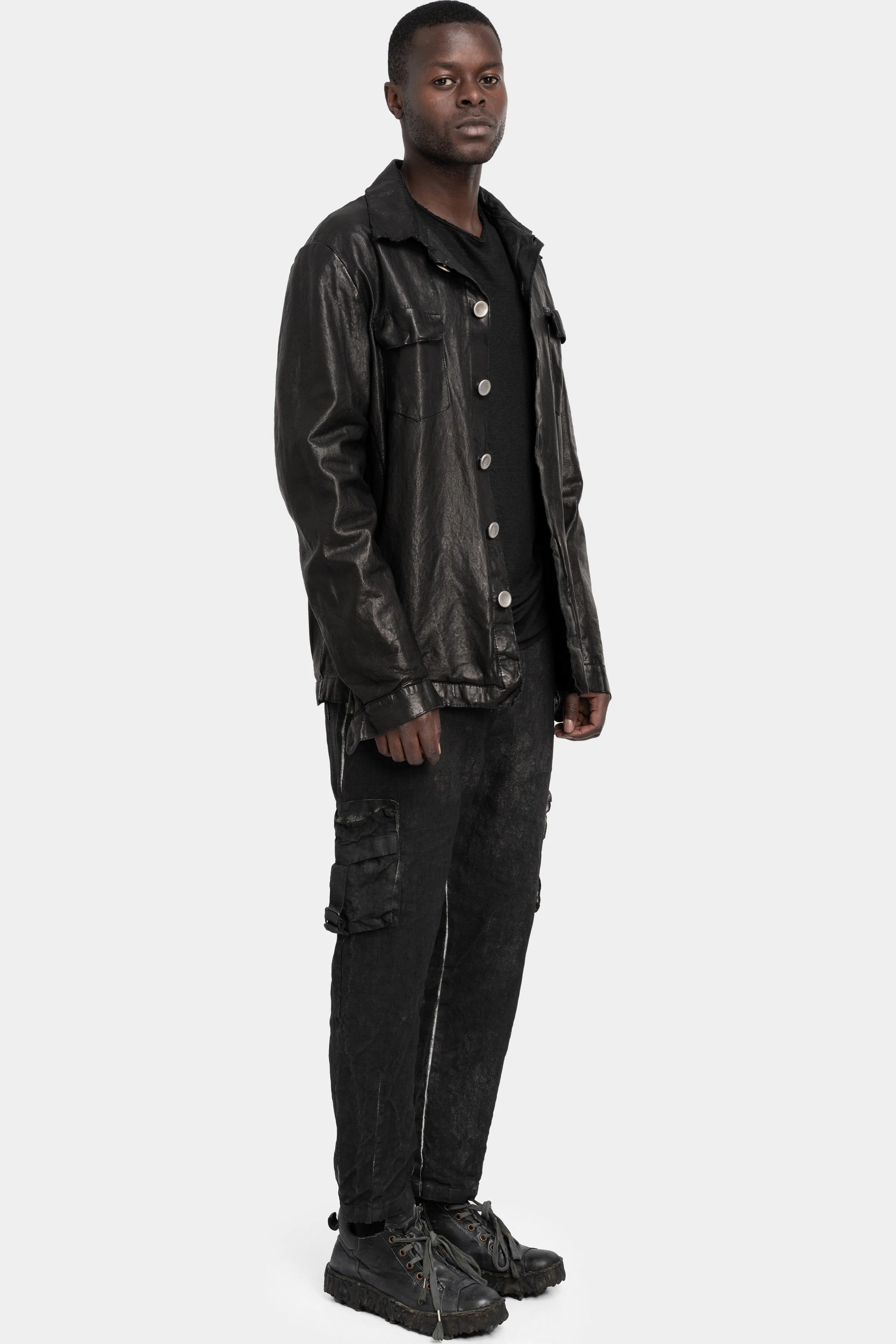 Buttoned up leather over shirt