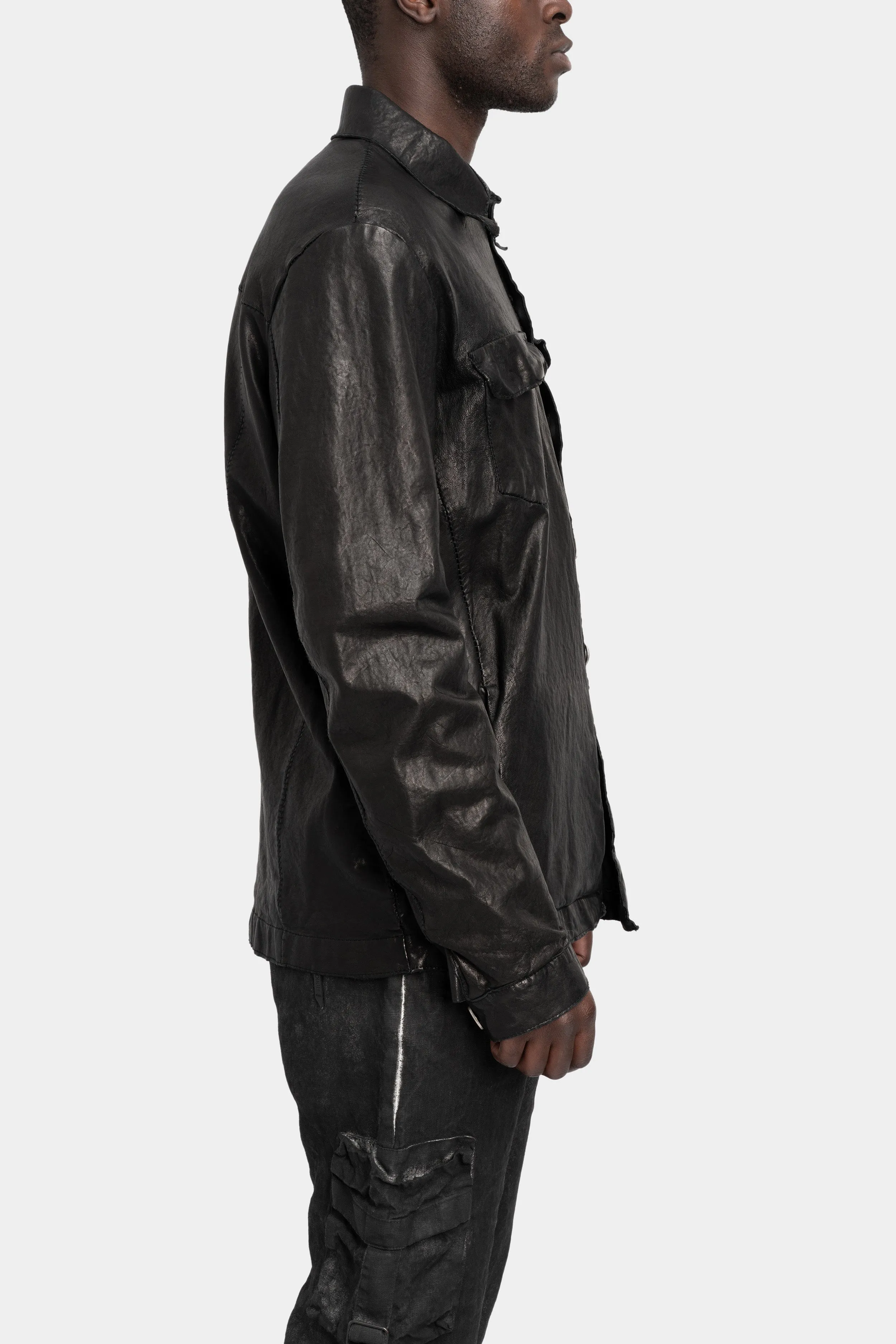 Buttoned up leather over shirt
