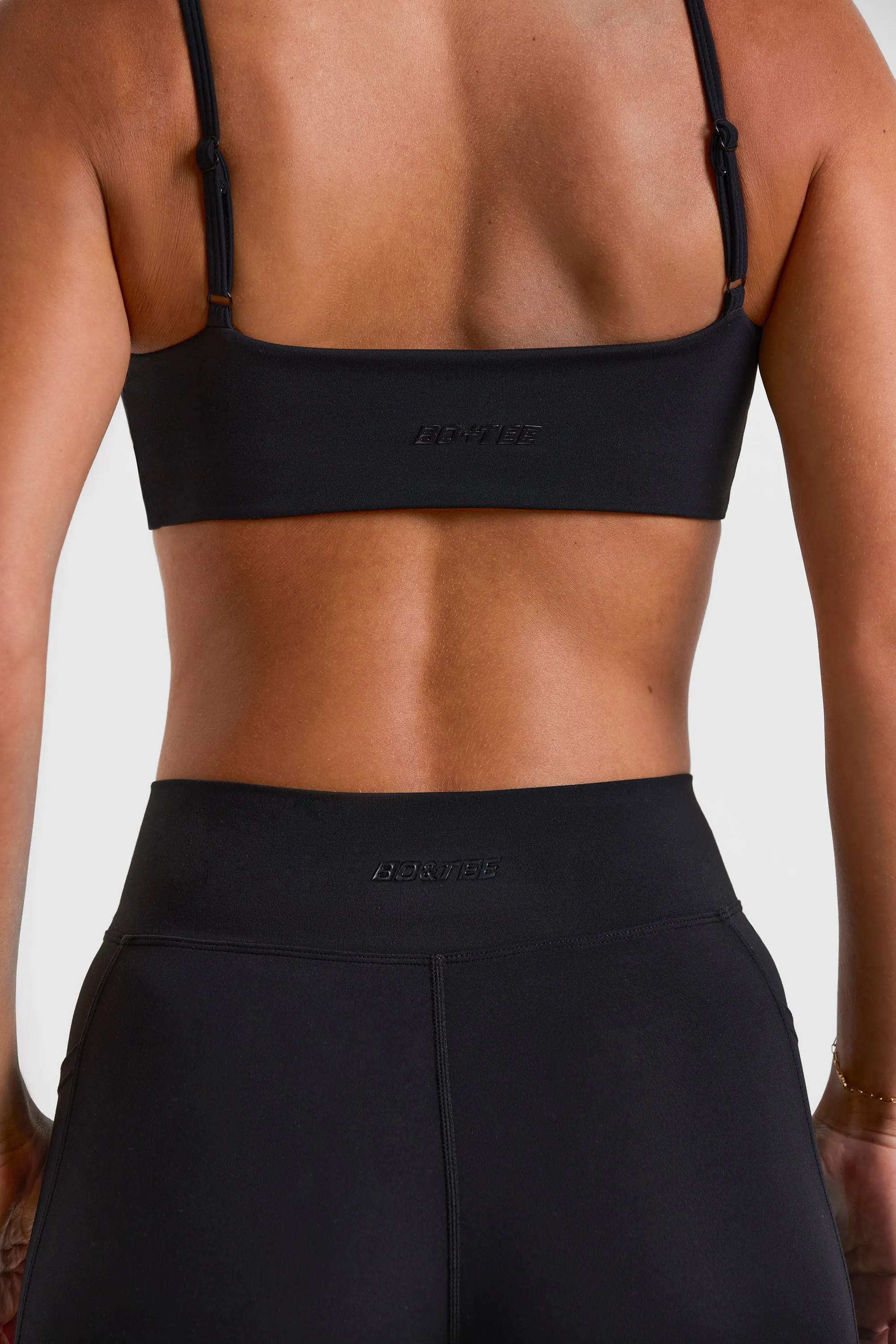 Match - Cross Waistband Flare Pocket Leggings in Black