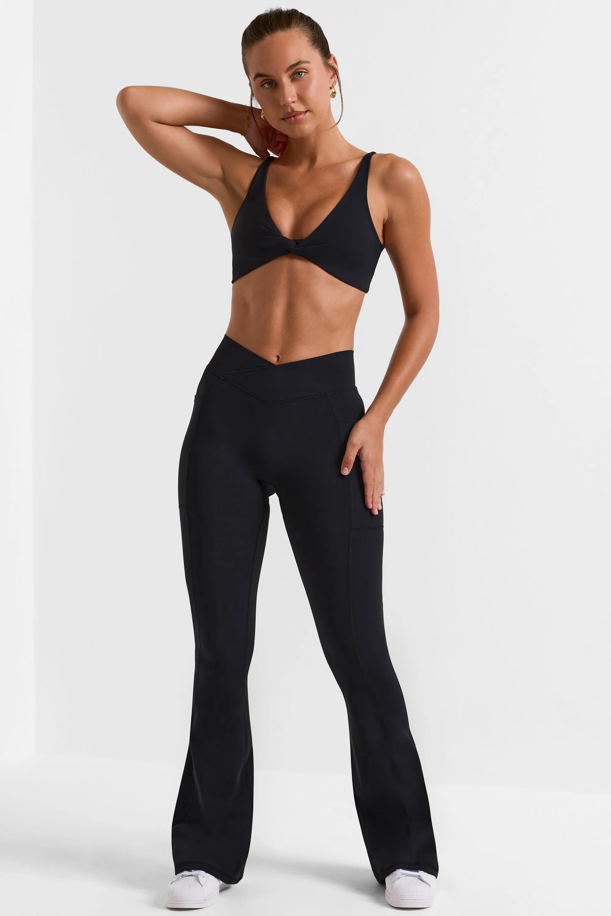 Match - Cross Waistband Flare Pocket Leggings in Black