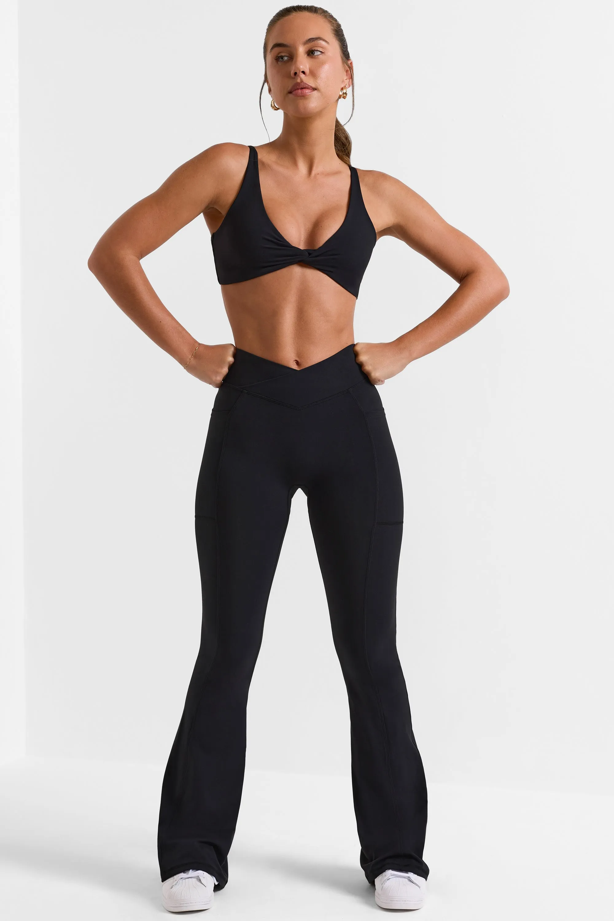 Match - Cross Waistband Flare Pocket Leggings in Black