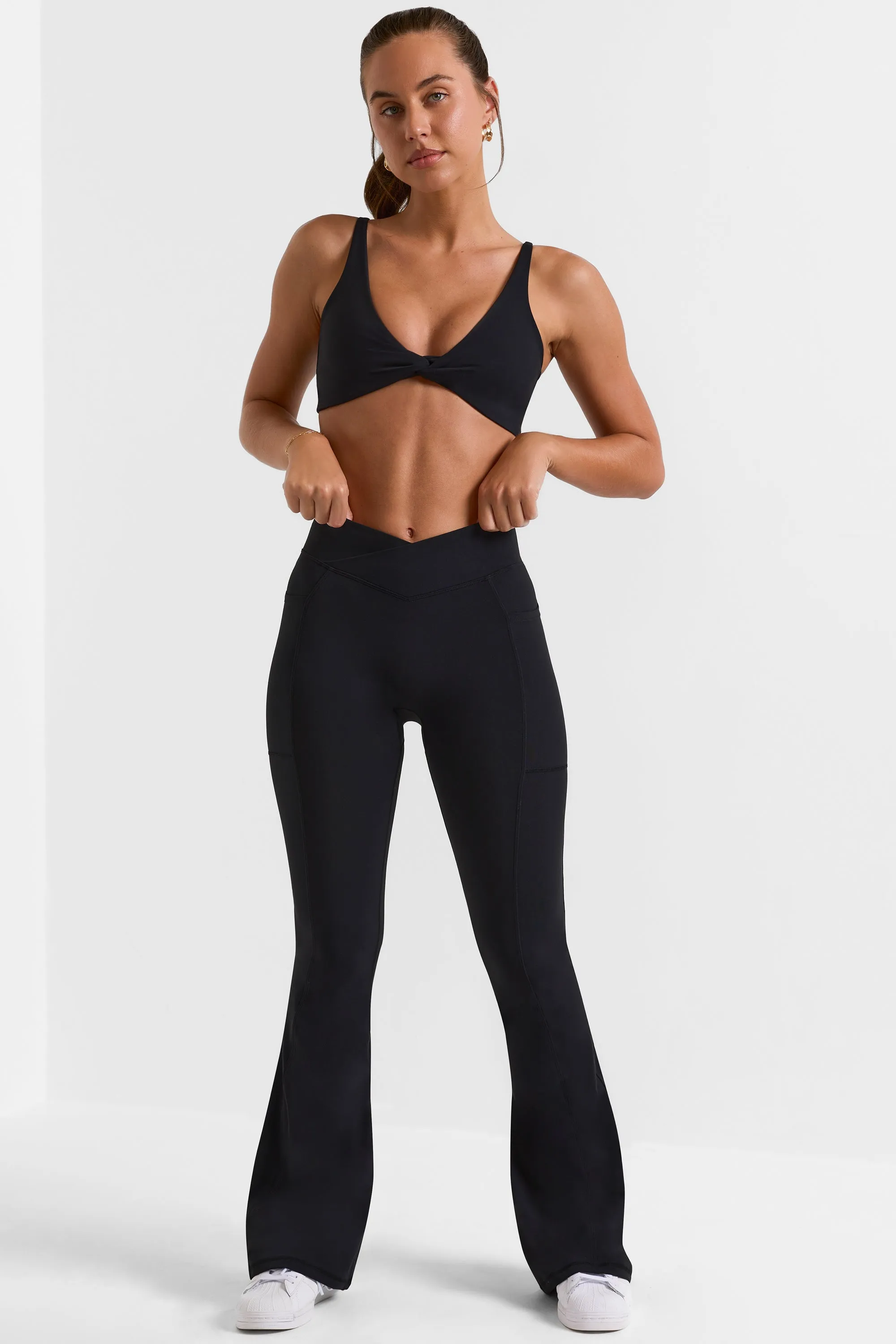 Match - Cross Waistband Flare Pocket Leggings in Black