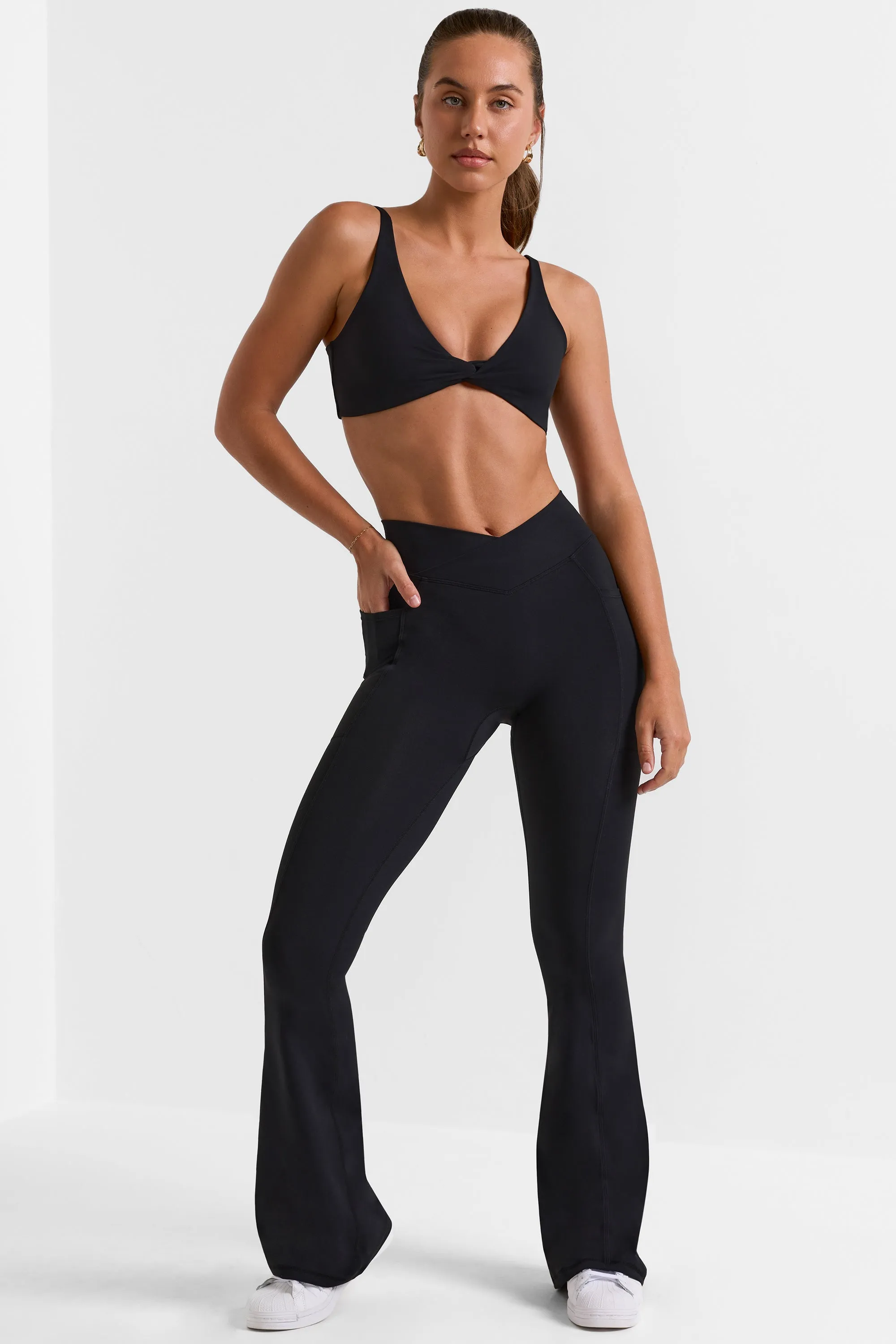 Match - Cross Waistband Flare Pocket Leggings in Black