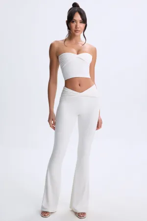 Petite Twist-Front Flared Trousers in White