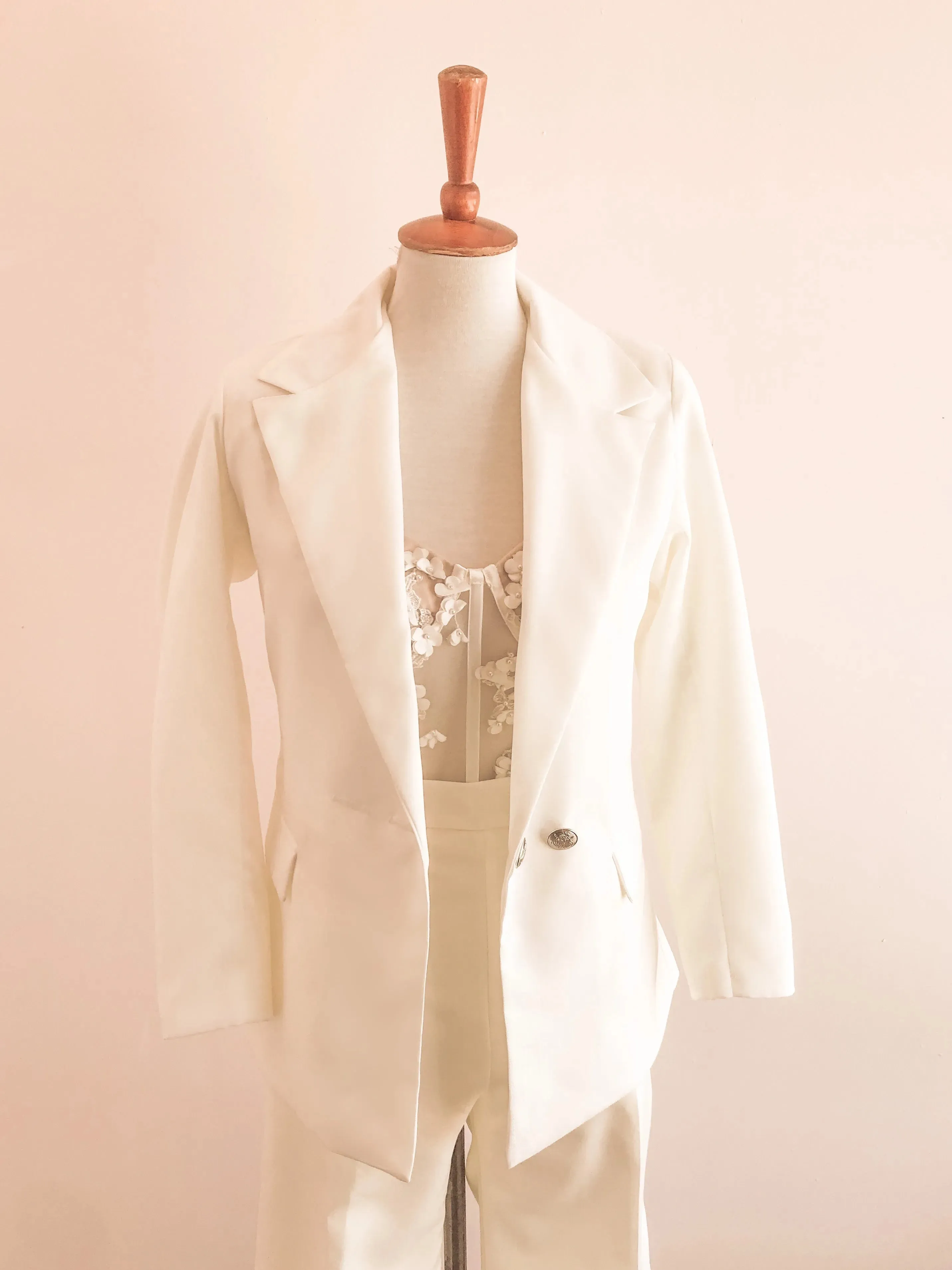 Sample of white jacket and flared trousers