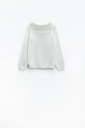 White sweater with a boat neckline